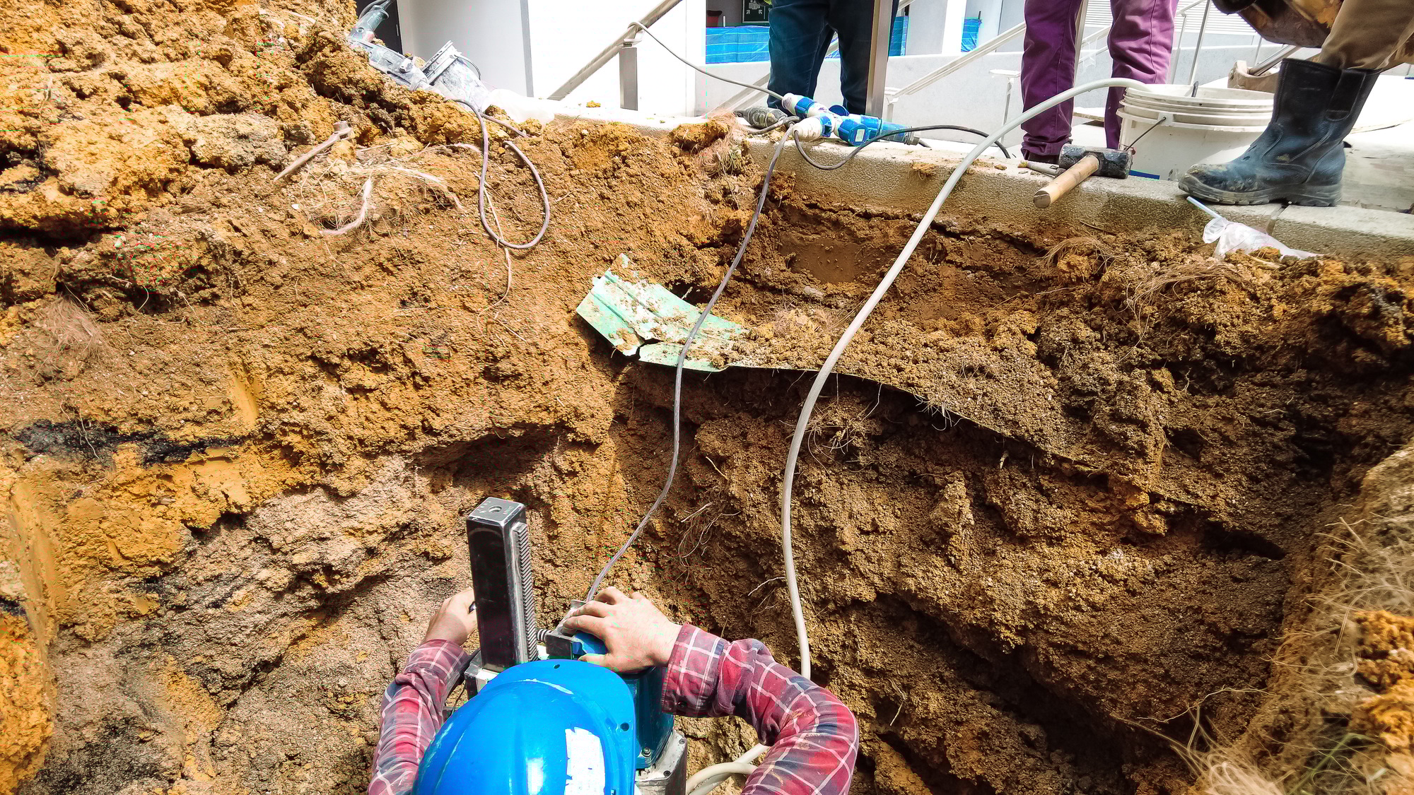 Group of worker and construction engineer doing earthwork in a construction site